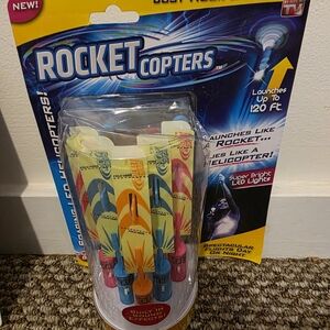 - Multicolor LED Slingshot Helicopters